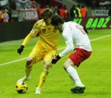 22 Marzec 2013; Danys Harmasz, Ukraina i Grzegorz Krychowiak, Polska. Mecz Eliminacji Mistrzostw Świata 2014 w Brazylii - Polska v Ukraina. Stadion Narodowy, Warszawa, Polska. Fot. Tomasz Żuber / GrFoto.org *** Local Caption *** 22 March 2013; Danys Harmasz, Ukraine and Grzegorz Krychowiak, Poland. The 2014 FIFA World Cup Brazil Qualification – UEFA Group H - Poland v Ukraine. Warsaw National Stadium, Poland. Picture credit: Tomasz Zuber / GrFoto.org