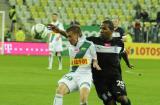 30 Wrzesień 2012; Łukasz Kacprzycki, Lechia Gdańsk i Luis Henriquez, Lech Poznań. Szósta kolejka T-Mobile Ekstraklasa 2012/2013 - Lechia Gdańsk v Lech Poznań. PGE Arena Gdańsk. Fot. Tomasz Żuber / GrFoto.org *** Local Caption *** 30 September 2012; Lukasz Kacprzycki, Lechia Gdańsk and Luis Henriquez, Lech Poznan. T-Mobile Ekstraklasa 2012/2013, Round 6 - Lechia Gdansk v Lech Poznan. PGE Arena Gdańsk. Picture credit: Tomasz Żuber / GrFoto.org