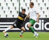 2 Lipca 2011; Mateusz Machaj, Lechia Gdańsk przeciwko zawodnikowi Olimpia Grudziądz. Pierwszy sparing po powrocie ze zgrupowania do Gdańska - Lechia Gdańsk v Olimpia Grudziądz. Stadion Miejski, Gdańsk. Fot. Tomasz Żuber / GrFoto.org  *** Local Caption *** 2 july 2011; Mateusz Machaj, Lechia Gdańsk. First sparing after the team come back to Gdańsk from being away - Lechia Gdańsk v Olimpia Grudziądz. City Stadium of Traugutta, Gdansk. Picture credit: Tomasz Żuber / GrFoto.org