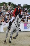 12 Czerwiec 2011; Luganer, w siodle Rikke Haastrup, Dania, podczas międzynarodowych zawodów jeździeckich w skokach przez przeszkody. Grand Prix Sopotu o Puchar NDI S.A. i nagrodę Prezydenta RP Bronisława Komorowskiego. Konkurs kwalifikacyjny do Olimpiady 2012 i ME seniorów 2011. Hipodrom, Sopot. Fot. Tomasz Żuber / GrFoto.org