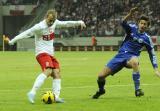 26 Marzec 2013; Kamil Grosicki, Polska i Matteo Coppini, San Marino. Mecz eliminacji Mistrzostw Świata 2014 - Polska v San Marino. Stadion Narodowy, Warszawa, Polska. Fot. Tomasz Żuber / GrFoto.org *** Local Caption *** 26 March 2013; Kamil Grosicki, Poland and Matteo Coppini, San Marino. 2014 FIFA World Cup qualification – UEFA Group H - Poland v San Marino. Warsaw National Stadium, Poland. Picture credit: Tomasz Zuber / GrFoto.org