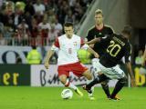 6 Wrzesień 2011; Adam Matuszczyk, Polska i Jerome Boateng, Niemcy. Międzynarodowy mecz towarzyski - Polska v Niemcy. Stadion PGE Arena Gdańsk. Fot. Tomasz Żuber / GrFoto.org  *** Local Caption *** 6 September 2011; Adam Matuszczyk, Poland and Jerome Boateng, Germany. International friendly match - Poland v Germany. Stadium PGE Arena Gdańsk. Picture credit: Tomasz Żuber / GrFoto.org