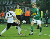 6 Kwiecień 2011; Ivans Lukjanovs, Lechia Gdańsk i Jakub Rzeźniczak, Legia Warszawa. Pierwszy mecz półfinału Pucharu Polski - Lechia Gdańsk v Legia Warszawa. Stadion Miejski, Gdańsk. Fot. Tomasz Żuber / GrFoto.org *** Local Caption *** 6 April 2011; Ivans Lukjanovs, Lechia Gdańsk and Jakub Rzeźniczak, Legia Warszawa. First match of the semi-finals - Lechia Gdańsk v Legia Warszawa. City Stadium of Traugutta, Gdansk. Picture credit: Tomasz Żuber / GrFoto.org