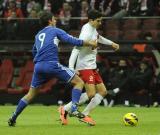 26 Marzec 2013; Robert Lewandowski, Polska i Matteo Coppini, San Marino. Mecz eliminacji Mistrzostw Świata 2014 - Polska v San Marino. Stadion Narodowy, Warszawa, Polska. Fot. Tomasz Żuber / GrFoto.org *** Local Caption *** 26 March 2013; Robert Lewandowski, Poland and Matteo Coppini, San Marino. 2014 FIFA World Cup qualification – UEFA Group H - Poland v San Marino. Warsaw National Stadium, Poland. Picture credit: Tomasz Zuber / GrFoto.org