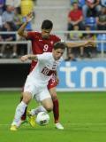 10 Wrzesień 2012; Łukasz Tymiński, Polska i Rui Fonte, Portugalia. Eliminacje Mistrzostw Europy - Polska v Portugalia. Stadion Miejski w Gdyni. Fot. Tomasz Żuber / GrFoto.org