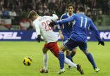 26 Marzec 2013; Łukasz Piszczek, Polska i Alex Gasperoni, San Marino. Mecz eliminacji Mistrzostw Świata 2014 - Polska v San Marino. Stadion Narodowy, Warszawa, Polska. Fot. Tomasz Żuber / GrFoto.org *** Local Caption *** 26 March 2013; Lukasz Piszczek, Poland and Alex Gasperoni, San Marino. 2014 FIFA World Cup qualification – UEFA Group H - Poland v San Marino. Warsaw National Stadium, Poland. Picture credit: Tomasz Zuber / GrFoto.org