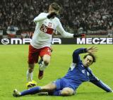 26 Marzec 2013; Łukasz Piszczek, Polska i Gian Luca Bellioni, San Marino. Mecz eliminacji Mistrzostw Świata 2014 - Polska v San Marino. Stadion Narodowy, Warszawa, Polska. Fot. Tomasz Żuber / GrFoto.org *** Local Caption *** 26 March 2013; Lukasz Piszczek, Poland and Gian Luca Bellioni, San Marino. 2014 FIFA World Cup qualification – UEFA Group H - Poland v San Marino. Warsaw National Stadium, Poland. Picture credit: Tomasz Zuber / GrFoto.org